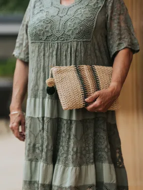 Pom Pom Stripe Woven Clutch Bag