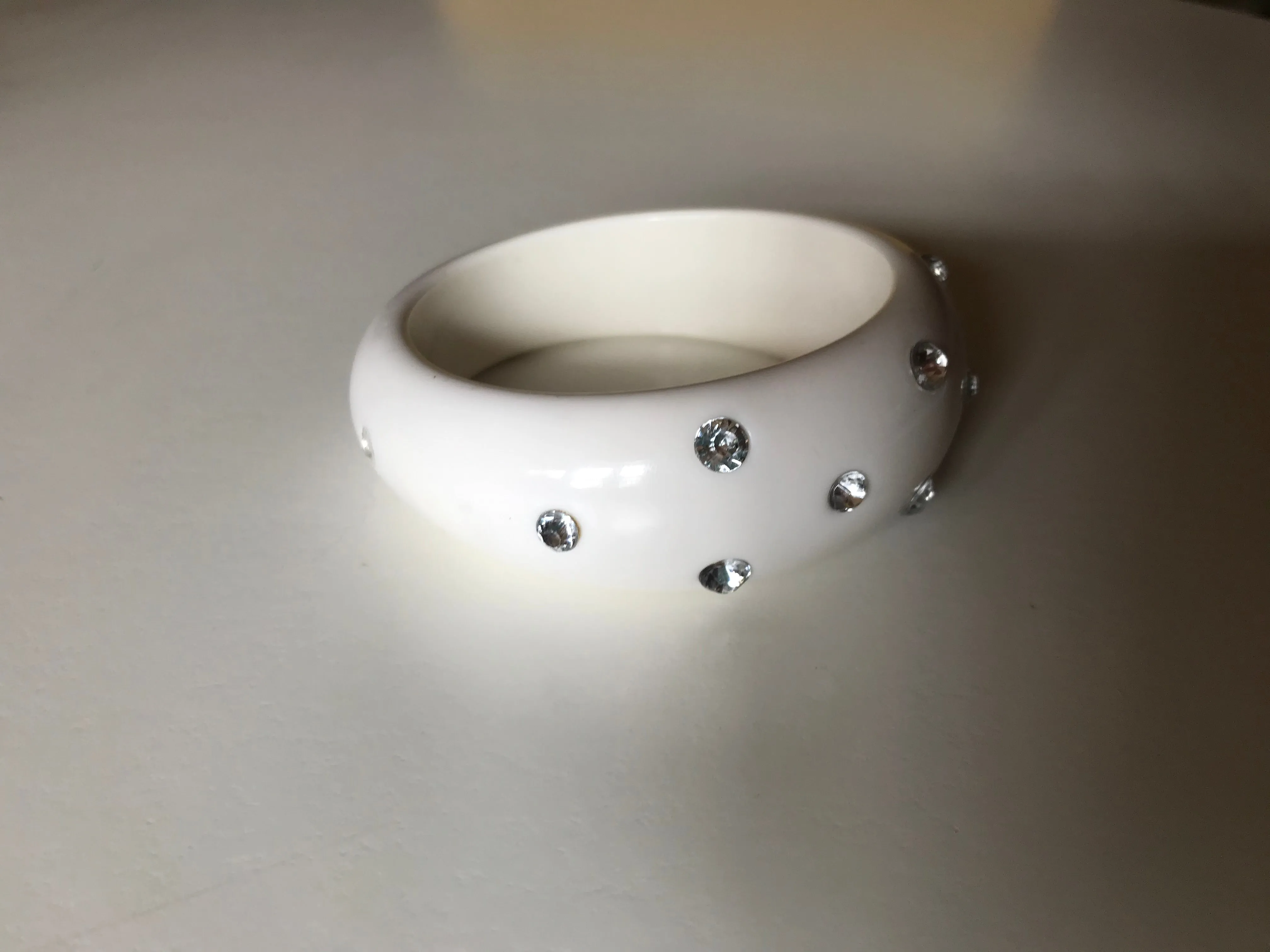 Rhinestone Dotted Wide White Heavy Plastic Bangle Bracelet circa 1980s